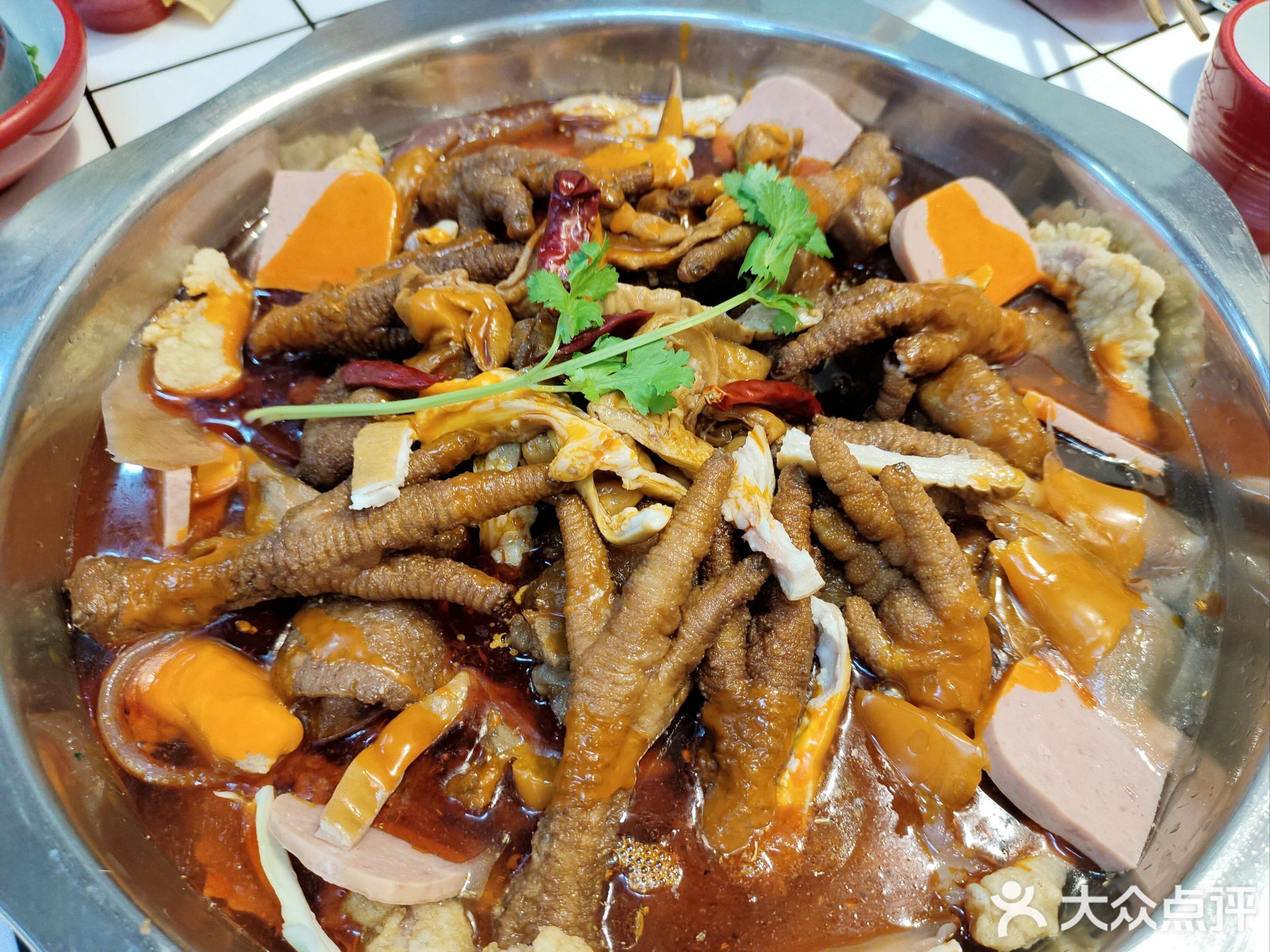 邓嬢嬢东北菜铁锅炖蹄花(海德盛世A区店)