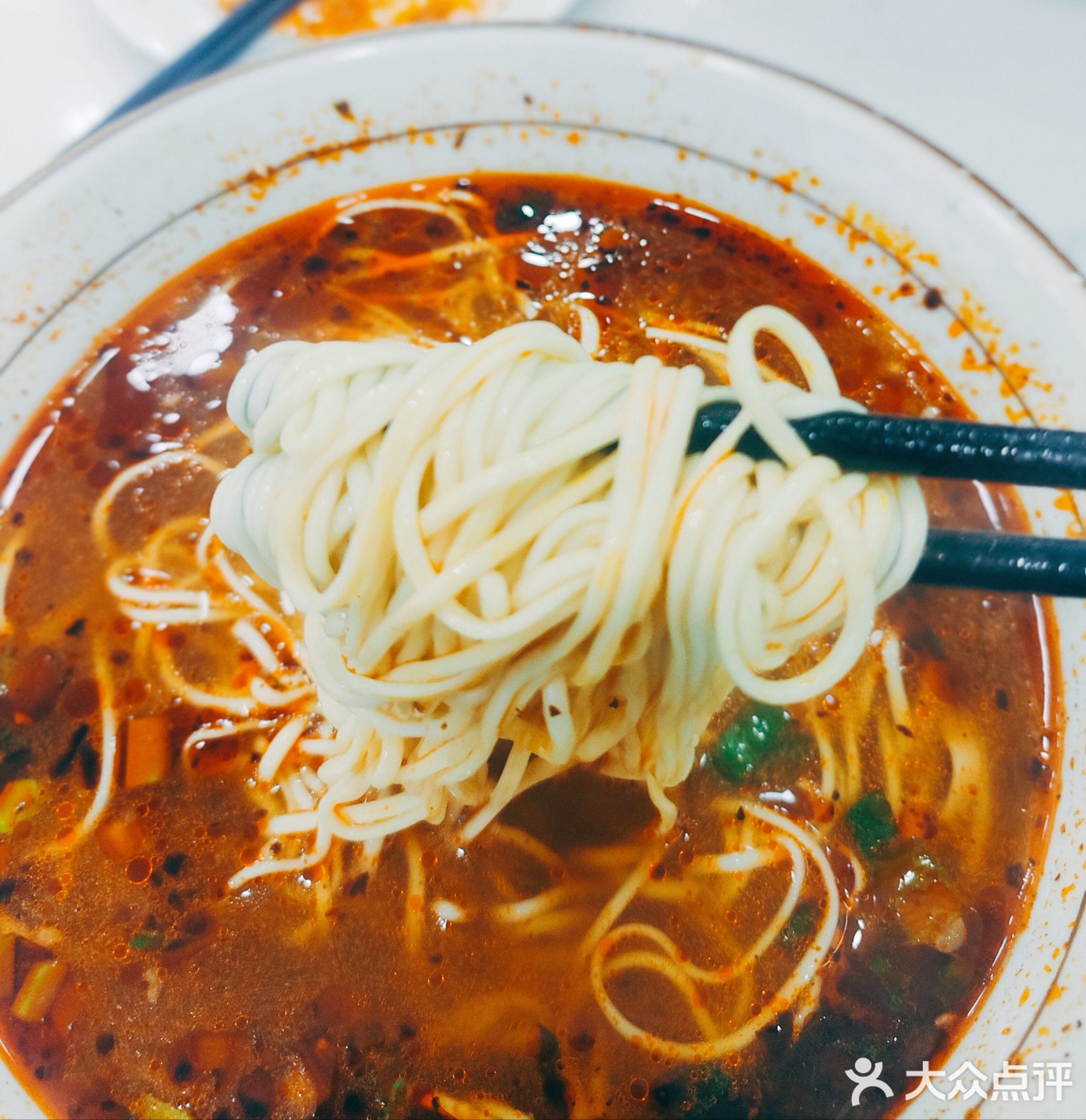 兰钕西伪豇遇牛肉拉面店